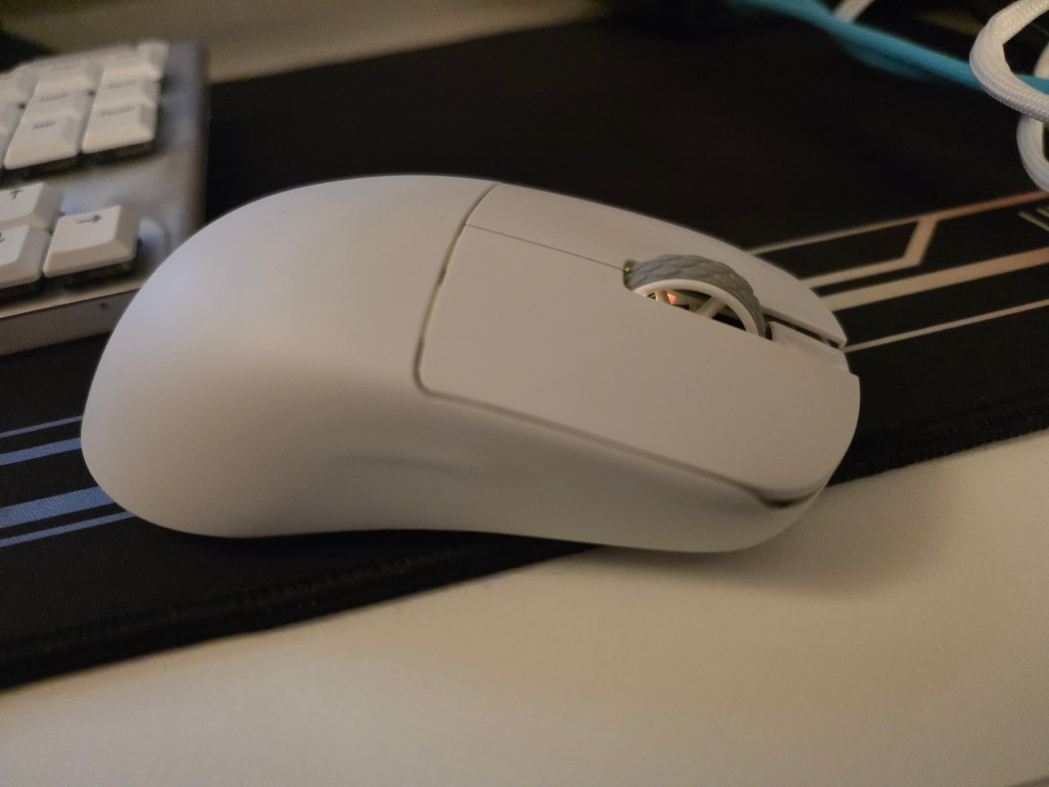 Mouse with RGB set to reddish-orange.